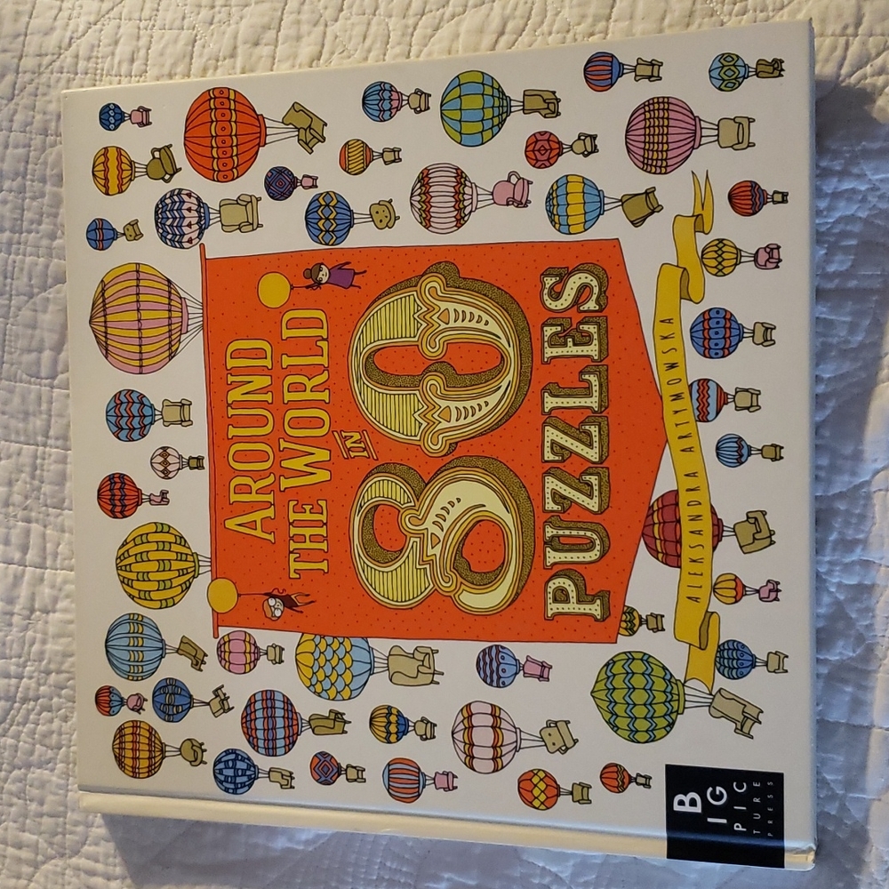 Around the World in 80 Puzzles hardcover book